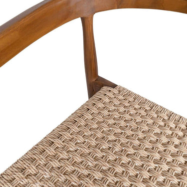 Close-up detail of the curved brown wood backrest and woven natural rope seat.