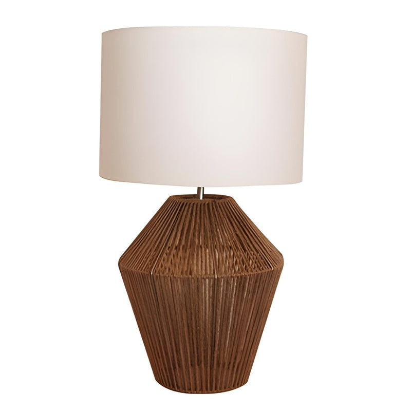 kuta jute table lamp featuring a bulbous hand-woven natural jute fiber base paired with a crisp parchment white poly linen fabric drum shade