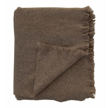 Lana brown throw blanket with frayed edges by Woodka Interiors 