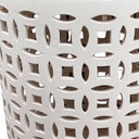 close up of the White Lattice Ceramic Stool with cylindrical form and central cutout