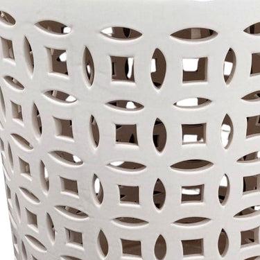 close up of the White Lattice Ceramic Stool with cylindrical form and central cutout