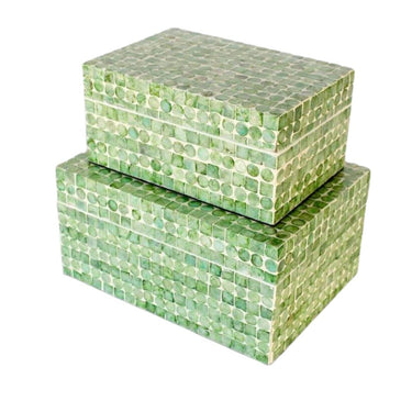 Set of two lime-green capiz decorative boxes for stylish organization and display.