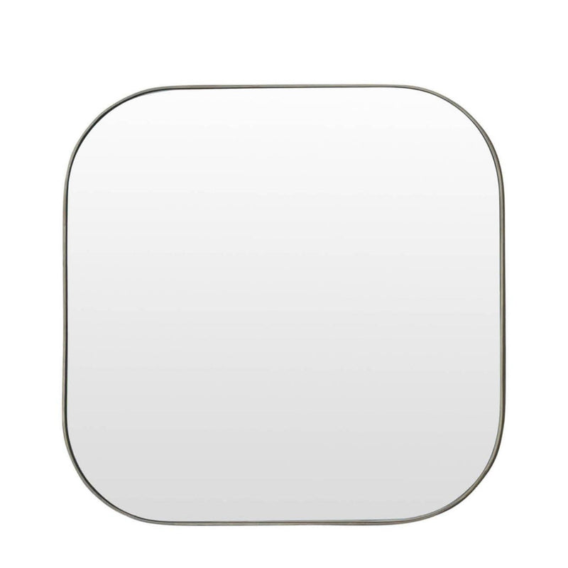 Modern rounded square wall mirror with a slim brushed brass frame.