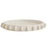 Lunaria off-white ceramic tray with a half-moon scalloped tab edge.