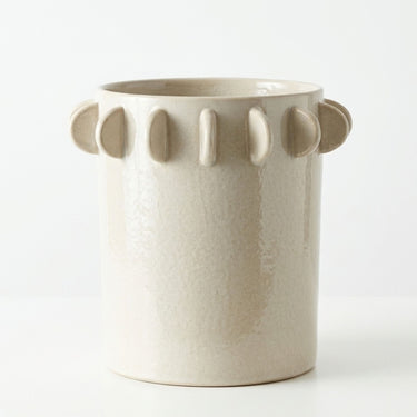 Large ivory ceramic vase with half-moon scalloped tab edge.