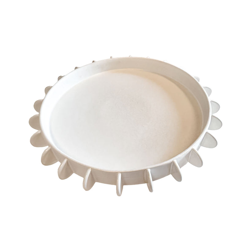 top view of  large Lunaria ivory ceramic tray with a ridged tabbed rim design.
