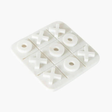 White marble tic-tac-toe board with X and O pieces