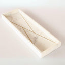 Angled shot of decorative marble tray showing depth and soft edge finish