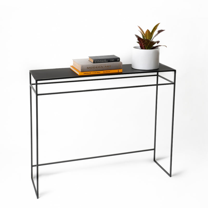 Modern industrial black hallway table with a slim profile. 