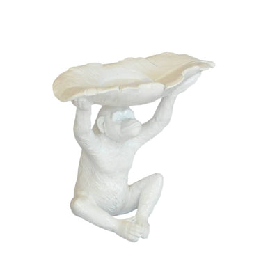 resin monkey candle holder holding a bowl for tealight candle