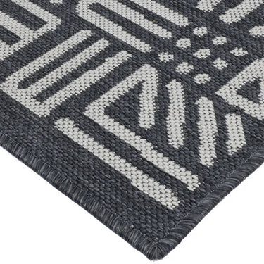 Durable, slip-resistant flat-woven area rug in grey tones