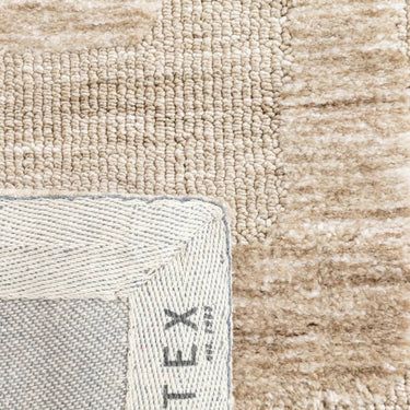 Close-up of the plush polyester texture of Mystery Rug in camel