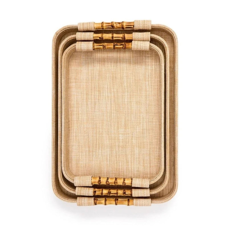 Set of three nesting grasscloth raffia rectangular trays with light beige woven texture and real bamboo handles