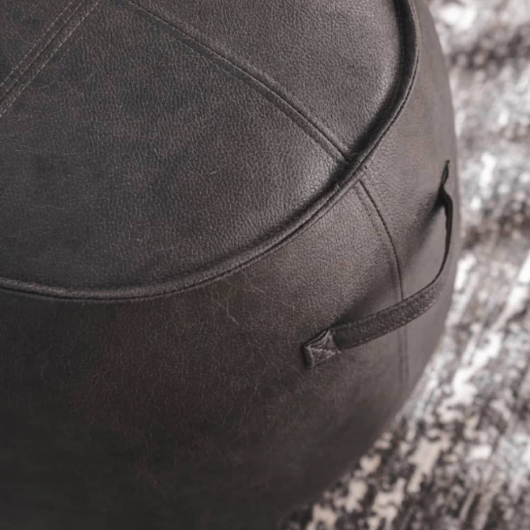 Close-up of Nero Boulder Stool  by woodka Interiors