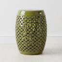 Green ceramic stool with a lattice cut out design.