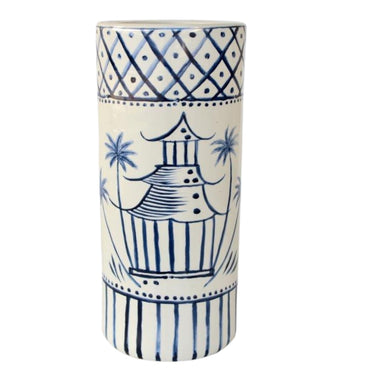 White ceramic umbrella stand with blue pagoda temple design for elegant home decor.