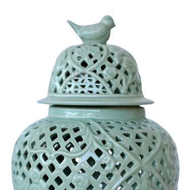 Pale Green Ginger Jar with cut-out floral ceramic detailing and bird-topped lid.