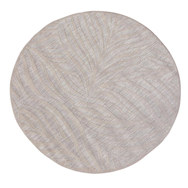 Pindo round outdoor rug textured with a subtle pattern by Woodka Interiors