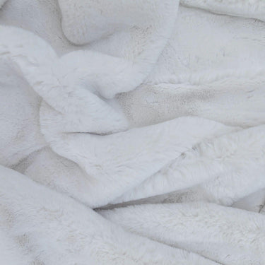 Polar faux fur throw close-up the textured white blanket