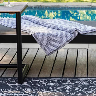 Poletti Black Area Rug Pool side