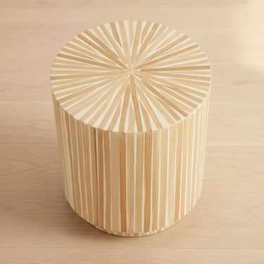 side table with a sunburst design and a mother of pearl finish 
