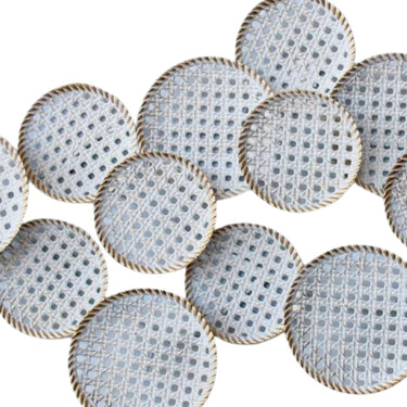 White and gold circles on a white background, reflecting a blend of natural textures and contemporary elegance in wall decor.