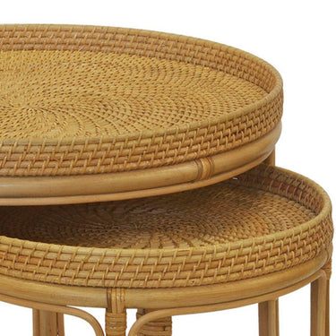 Top view showing large and small round rattan tables with natural woven surfaces