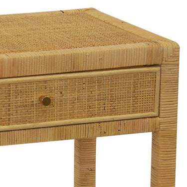 Elegant rattan nightstand perfect for modern interiors.