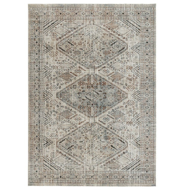 Remnant rug in oxide distressed Persian-inspired area rug in earthy neutrals made from 100% recycled polyester at Woodka Interiors.