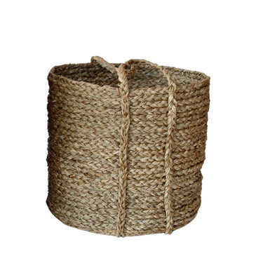 Handwoven seagrass baskets for stylish storage.