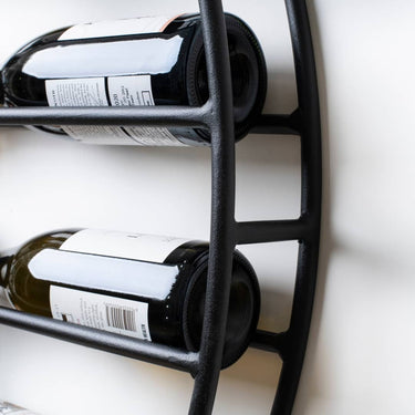 close up of a metal wine rack 