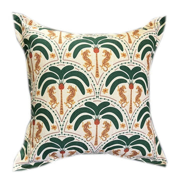 Safari palm scatter cushion with repeating pattern of green palm trees and golden leopards