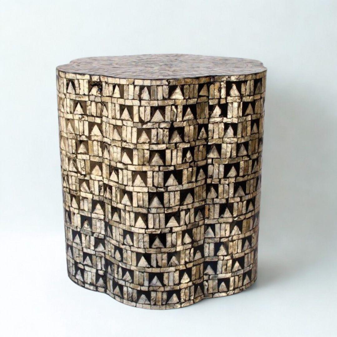 Mother-of-pearl inlay accent table in mixed metallic tones