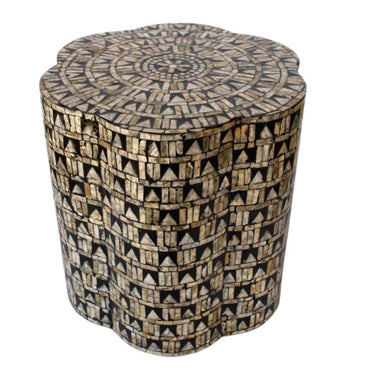 Decorative accent table with scalloped edges and shimmering finish