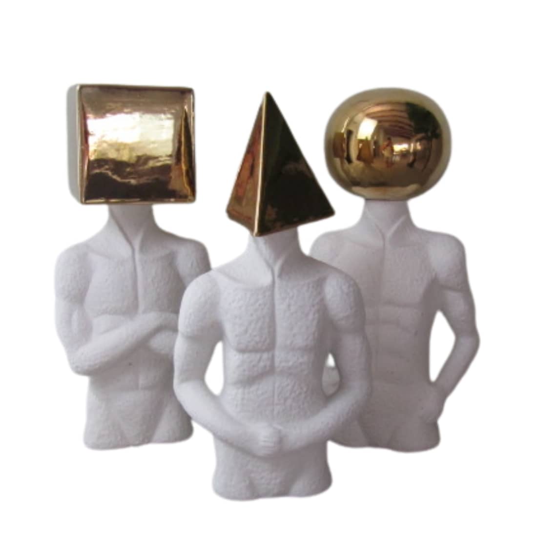 Set of three figurines with geo shaped heads