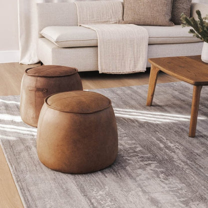 cozy living room setup with a beige sofa and wooden coffee table by Woodka Interiors