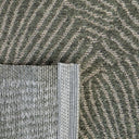 Seychelles runner rug close-up of textured fabric with a herringbone pattern in green