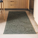 Fully outdoor seychelles runner in green featuring a shell pattern in a kitchen setting.
