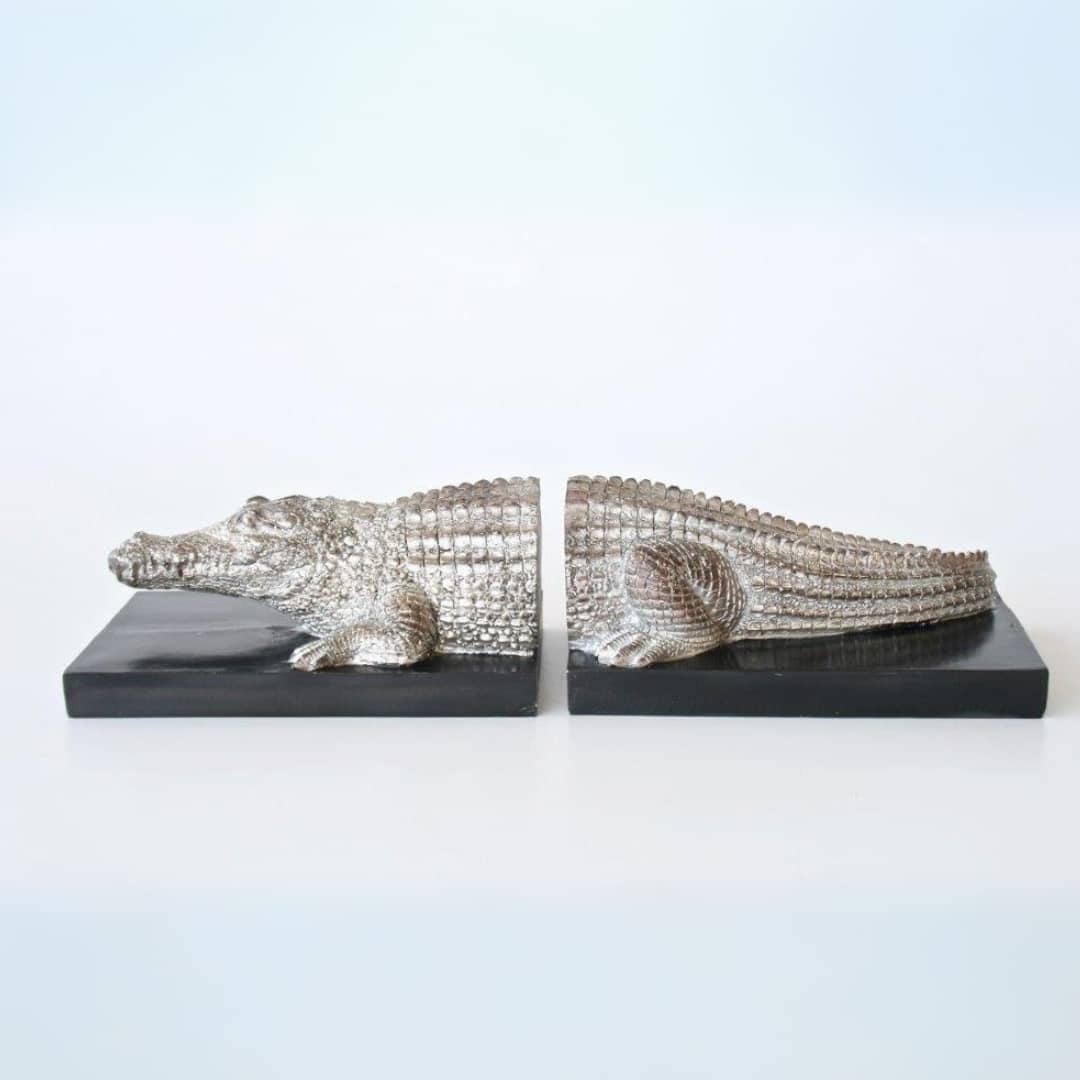 Crocodile Decorative bookends with a sleek silver finish, ideal for any contemporary living space.