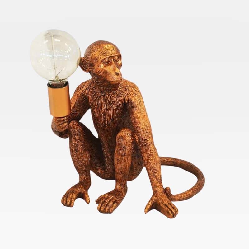 Sitting monkey lamp in copper