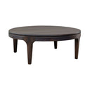 Summerhouse round dark wood coffee table in Coco finish made of solid mango wood.
