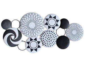Tonga Metal Wall Decor featuring black and white metal circles inspired by traditional Tonga basket designs for elegant interiors
