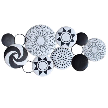 Tonga Metal Wall Decor featuring black and white metal circles inspired by traditional Tonga basket designs for elegant interiors