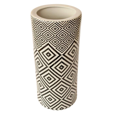 Stylish ceramic umbrella stand, ideal for entryways or as a bold decor accent.