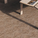 modern outdoor lounge area grounded by a large vavua weather-resistant neutral area rug.