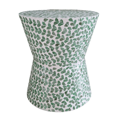 Vine Accent Stool, showcasing capiz decor at its best, effortlessly combines style and functionality. Perfect as an elegant accent stool or a chic side table, this versatile piece adds beauty to any space.