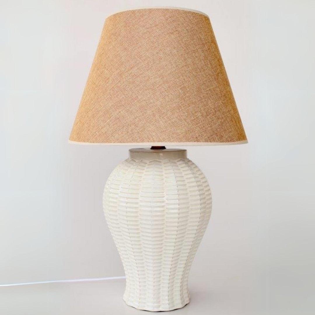 Nature-inspired ceramic lamp base with a soft beige shade.