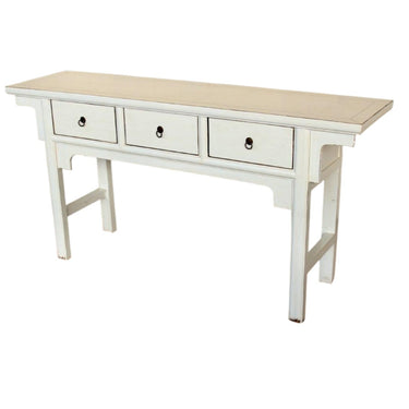 White 3-drawer entrance server console table in a classic mandarin style by Woodka Interiors.
