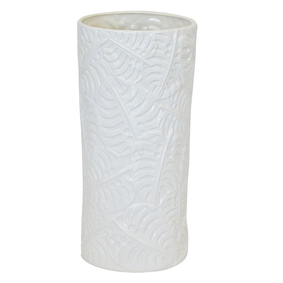 Crisp white ceramic umbrella stand with Monstera leaf design and glossy finish.