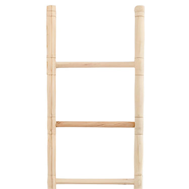 Minimalist wooden ladder for home décor and storage.